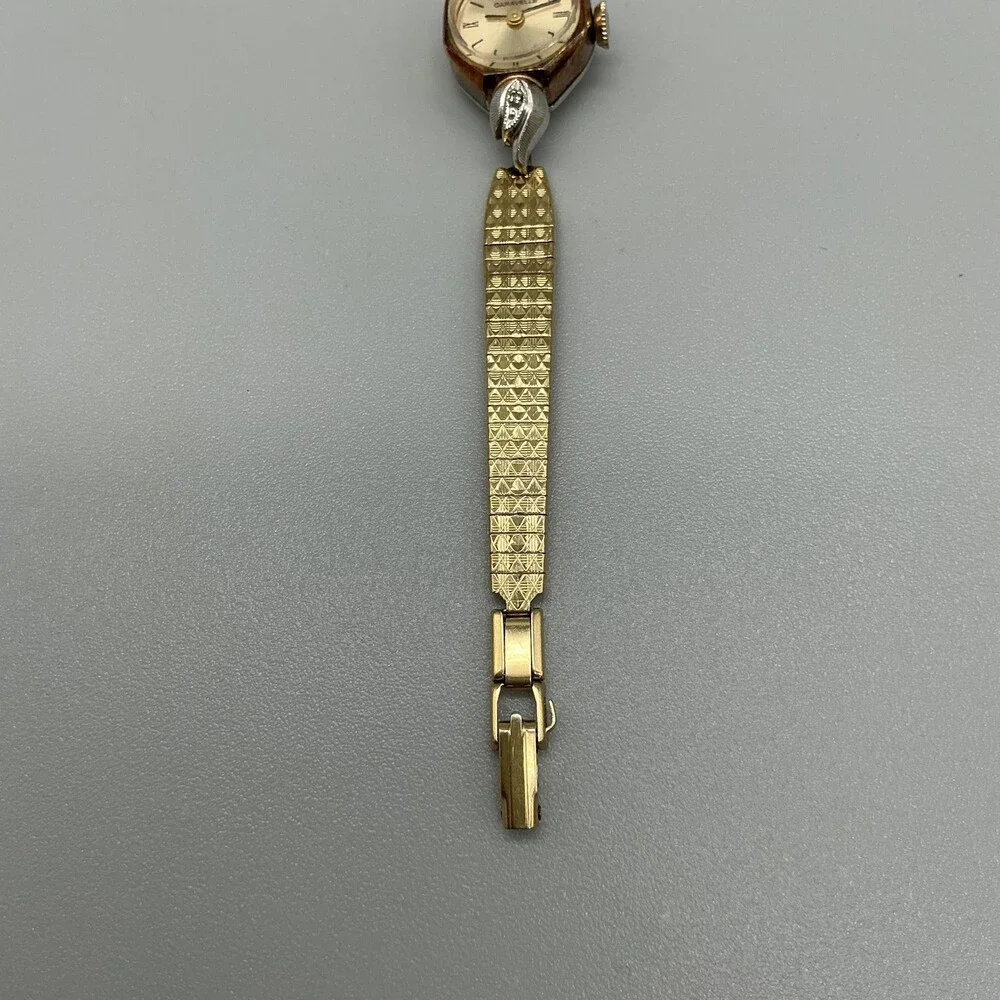 Vintage Caravelle Womens Watch 14mm Champagne Gold Tone Bracelet Diamond Manual